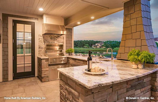 Luxury outdoor living of The Birchwood house plan 1239.