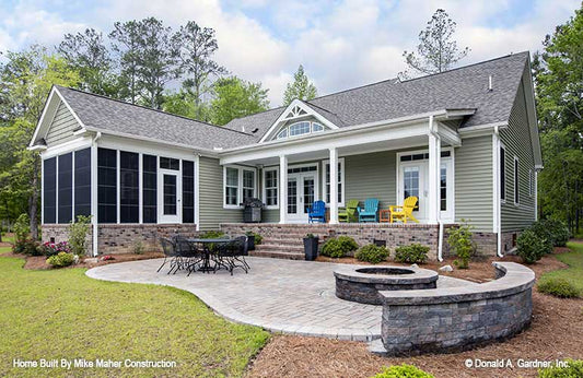 Backyard with firepit of The Drake house plan 1371.