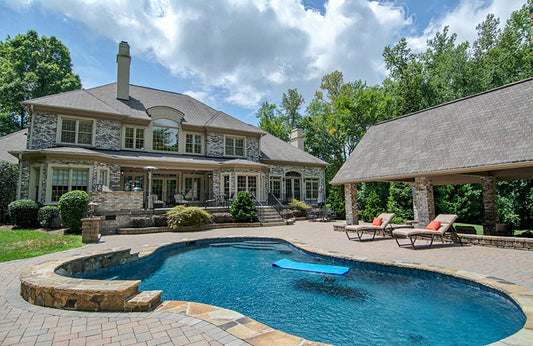 Backyard swimming pool of The Wedgewood house plan 806.