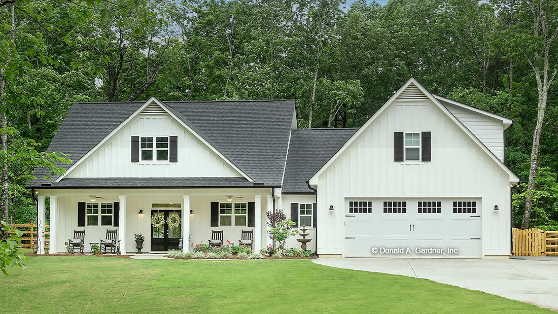 Modern farmhouse design with a white front exterior. The Ashbry house plan 1506.