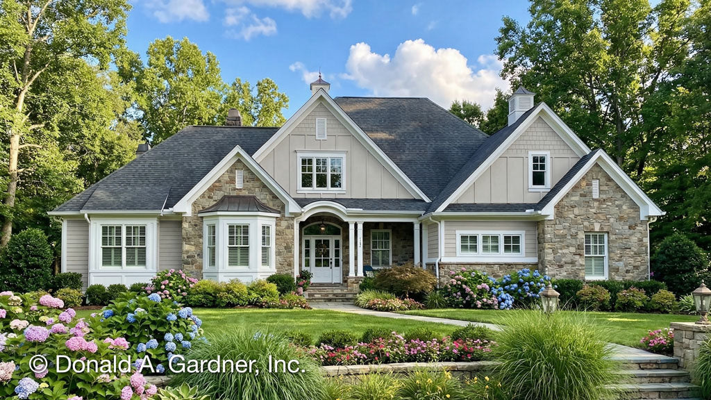 Stylish house with stone facade and garden in front, featuring 'Donald A. Gardner, Inc.' branding.