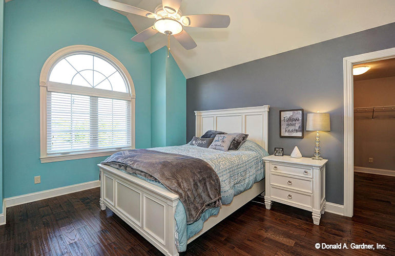 Blue and gray walls in the secondary bedroom. The Barclay plan 248.