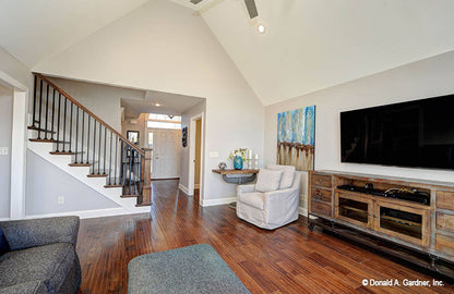 Wood flooring and view to the staircase in the great room. The Barclay plan 248.