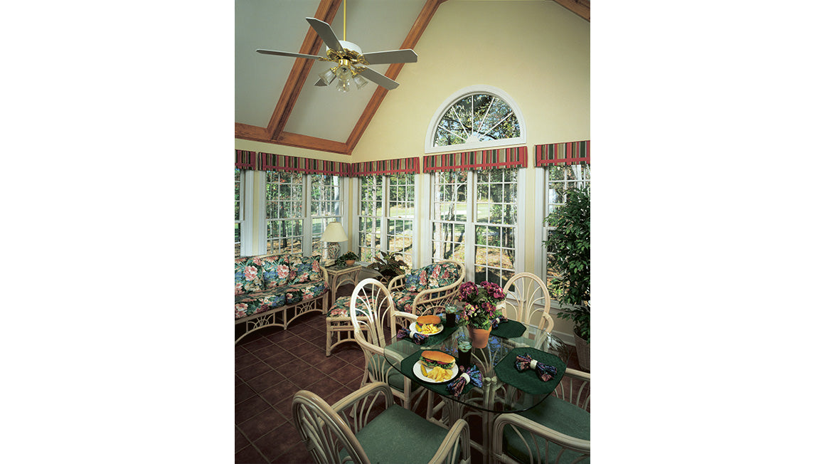 This is a photo of the sunroom for traditional house plan 297 The Irwin as built by a customer