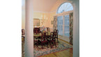 This is a photo of the dining room for traditional house plan 297 The Irwin as built by a customer