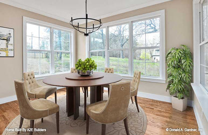 Large windows in the dining room giving lots of natural light. Agatha plan 1500