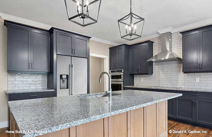 Spacious kitchen with granite island. Agatha plan 1500