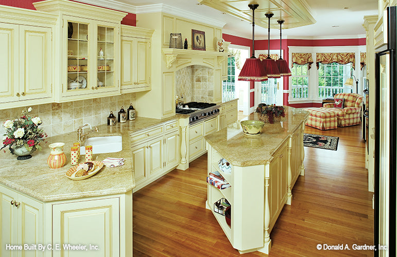 Cream colored cabinets and tiled backsplash. The Arbordale plan 452.