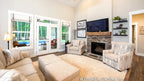 The great room is the primary gathering and entertainment space for one story house plan 1506 The Ashbry