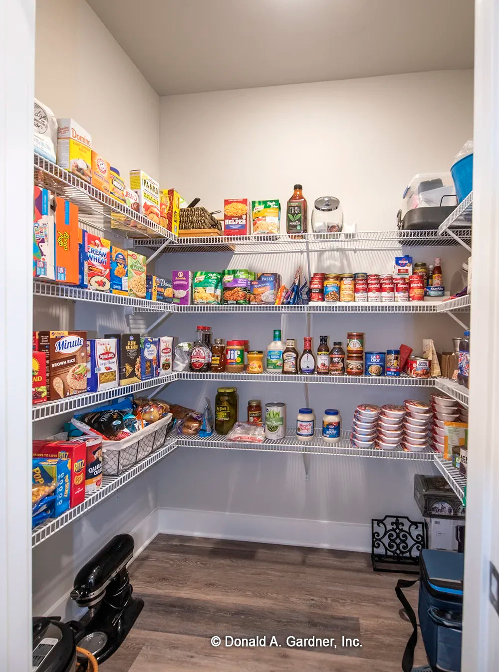 walk-in pantry with lots of shelving