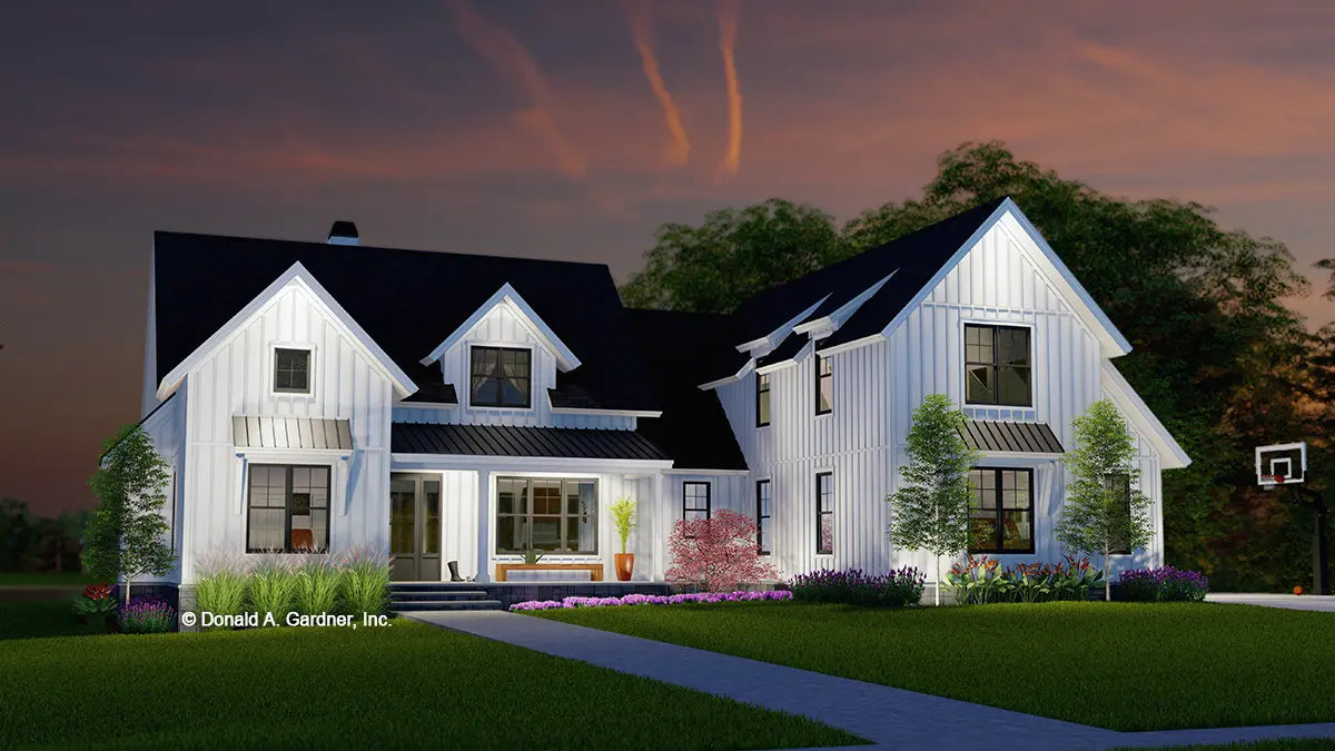 This is an illustration of the front of one story house plan 1617 The Audrey at dusk