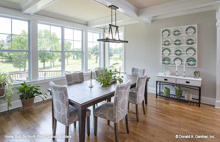 An open dining room gives space for both formal and casual dining for craftsman house plan 1409 The Austin