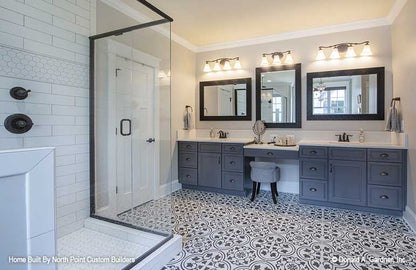 The master bath provides a private oasis for craftsman house plan 1409 The Austin