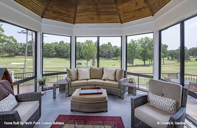 Enjoy the outdoors sheltered from the elements on the screen porch of craftsman house plan 1409 The Austin