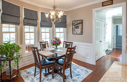 Crown molding along the ceiling and chandelier in the breakfast nook. The Avant plan 1346.