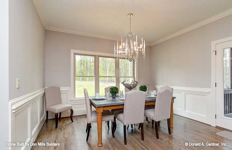 Crown molding along the ceiling and chandelier in the dining room. The Bantry plan 1336.