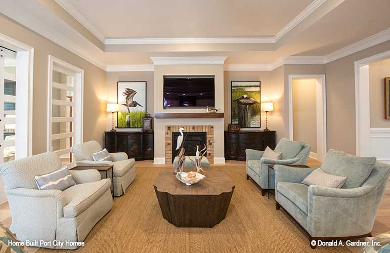 Tray ceiling and fireplace in the great room. The Barlett plan 1372. 