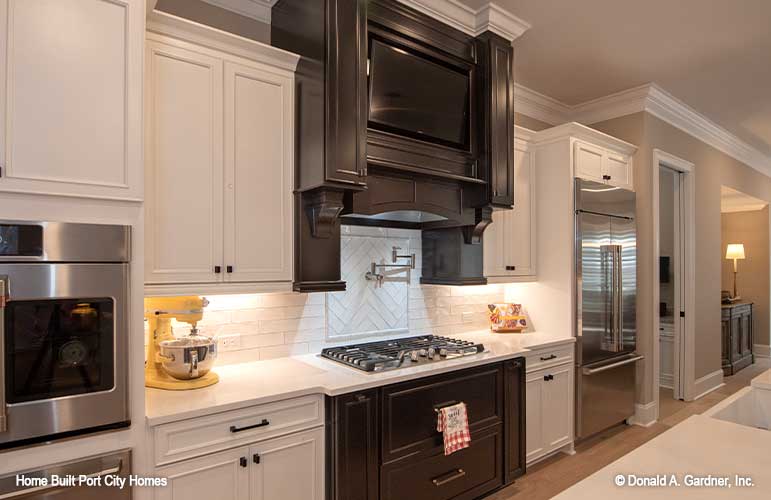 Crown molding along the ceiling in the kitchen. The Barlett plan 1372. 