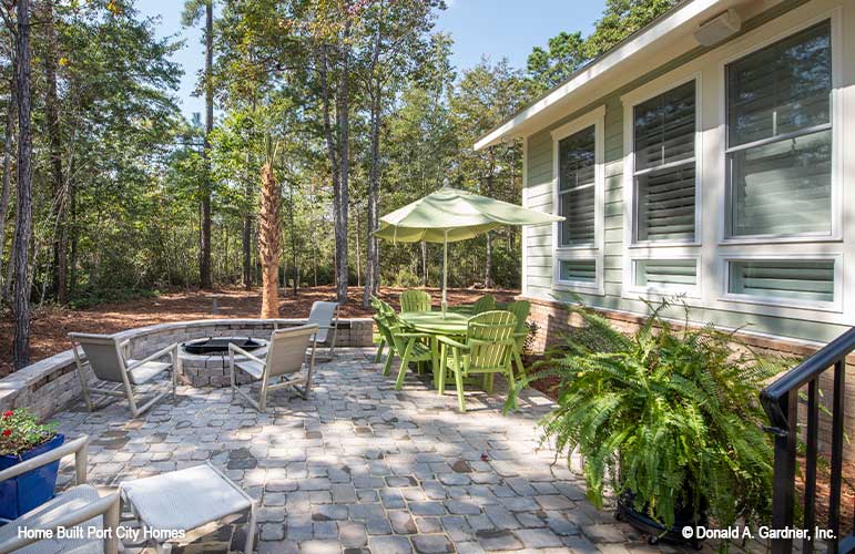 Rear patio with firepit. The Barlett plan 1372. 