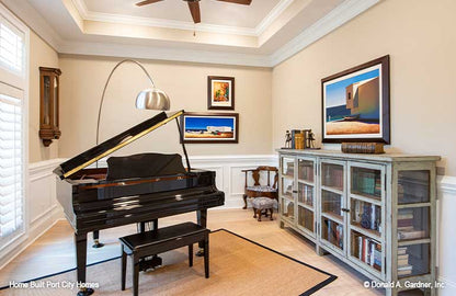 Tray ceiling and elegant piano in the study. The Barlett plan 1372. 