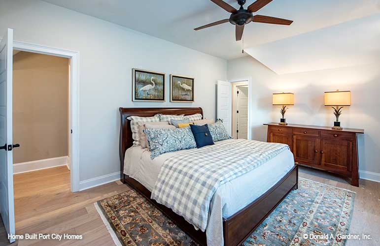 Cozy secondary bedroom with ceiling fan. The Barlett plan 1372. 