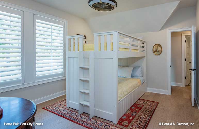 Double windows in secondary bedroom with bunkbeds. The Barlett plan 1372. 