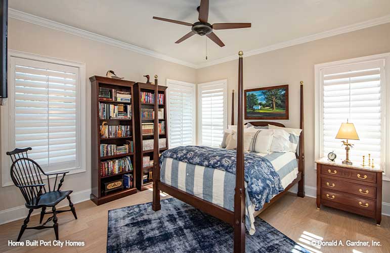 Well-lit secondary bedroom with ceiling fan. The Barlett plan 1372. 