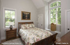 Arched window and bench seating in the secondary bedroom. The Baskerville plan 1312.