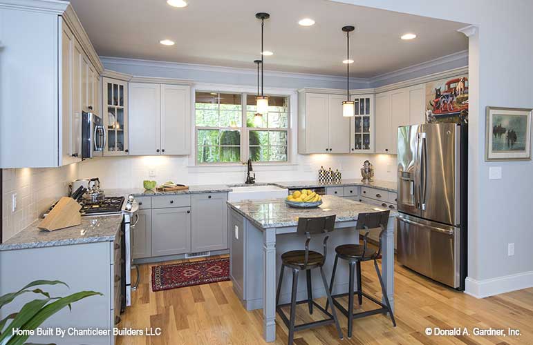 Kitchen island with seating. The Baskerville plan 1312.