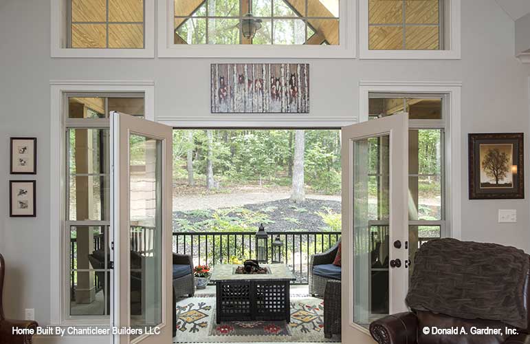 Patio doors open into the great room to the screened in porch. The Baskerville plan 1312.