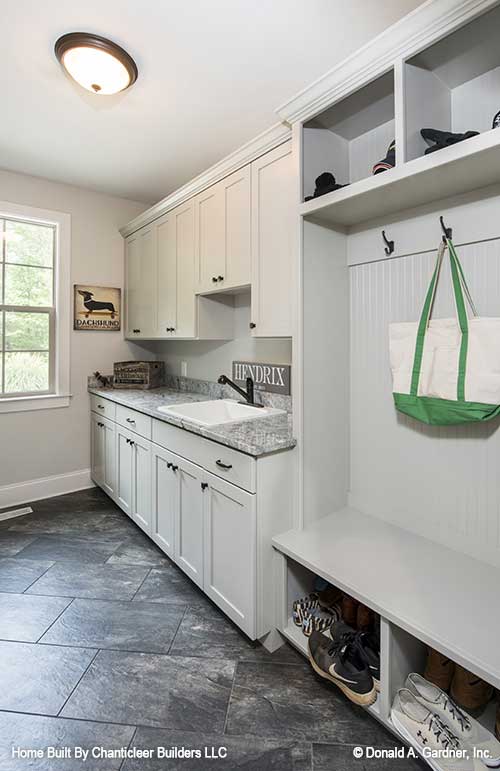 Wall tree and cabinets in the utility room. The Baskerville plan 1312.