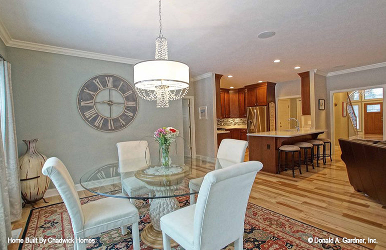 Dining room view with the kitchen off to the side. The Beauxville plan 1236.