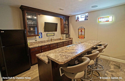 Bar seating at the wet bar. The Beauxville plan 1236.