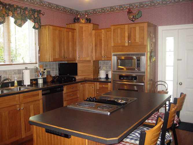 This is a photograph of the kitchen of four bedroom house plan 308 The Bentonville as built by a customer