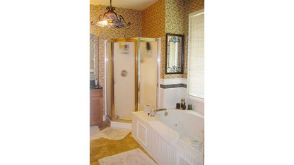 This is a photograph of the master bathroom shower of four bedroom house plan 308 The Bentonville as built by a customer