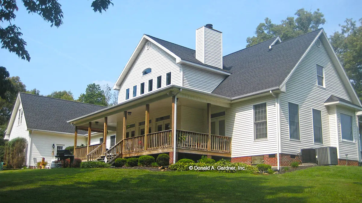 This is a photograph of the rear of country house plan 308 The Bentonville as built by a customer