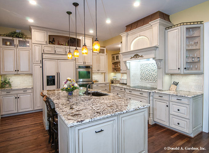 Sink and seating in the kitchen island. The Birchwood plan 1239.