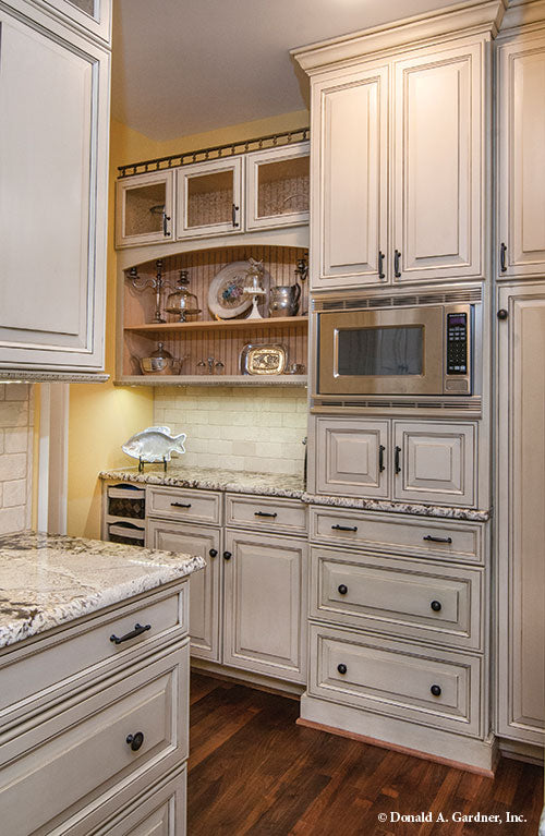 Floor to ceiling cabinets in the kitchen. The Birchwood plan 1239.