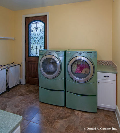 Spacious laundry are in the utility room. The Birchwood plan 1239.