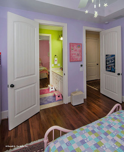 Bedroom view into jack and jill bathroom and hallway. The Birchwood plan 1239.