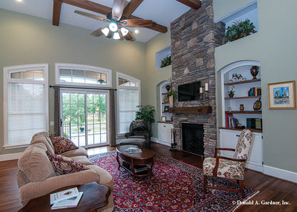 Coffered ceilings with stained beams in the great room. The Birchwood plan 1239.