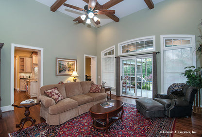 Sliding glass doors in the great room leading to rear patio. The Birchwood plan 1239.