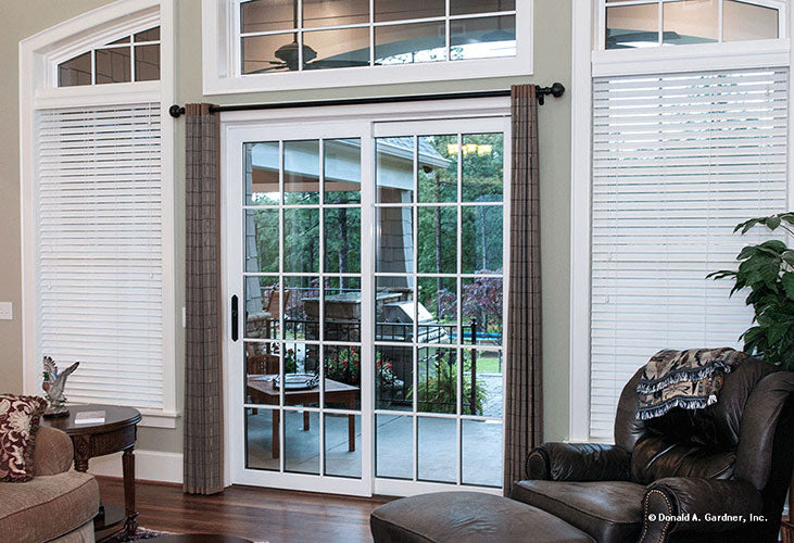 Sliding glass doors in great room leading to back patio. The Birchwood plan 1239.