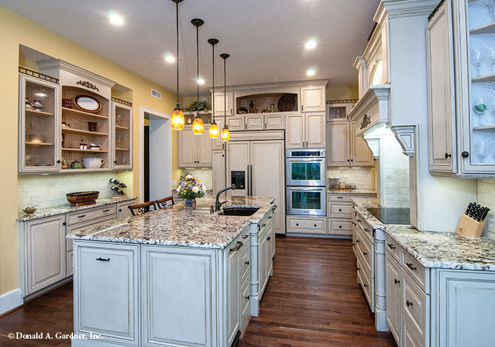 Full view of the kitchen and island. The Birchwood plan 1239.