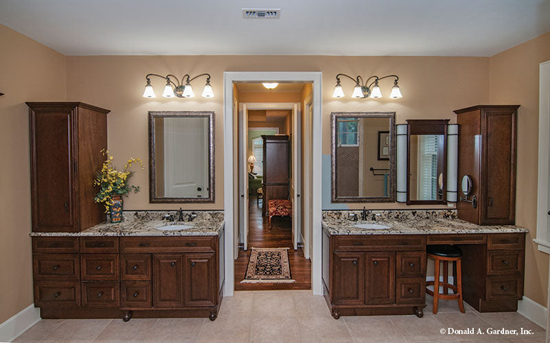 Separate vanities in the master bathroom. The Birchwood plan 1239.