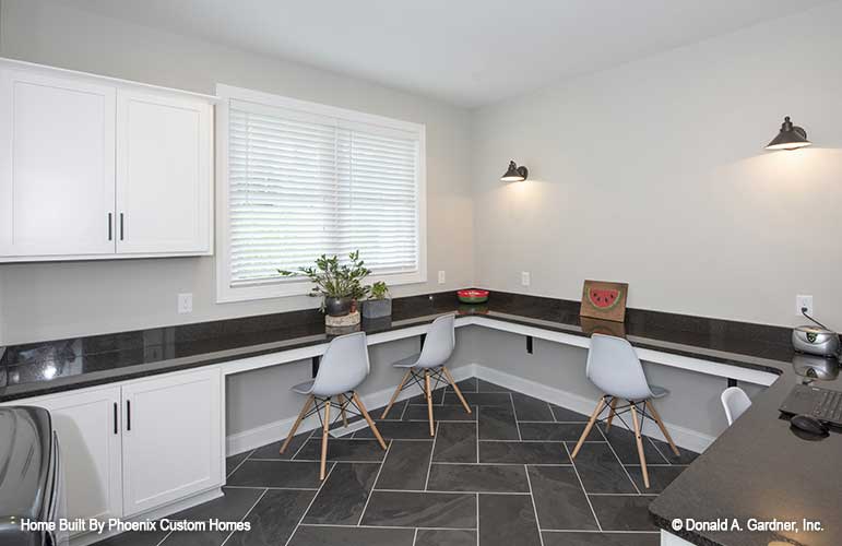 Quiet space for homework in this study with wrap around desk counters. Blarney plan 1424 