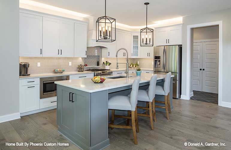 Perfect kitchen for gathering, seating at the kitchen island. Blarney plan 1424 