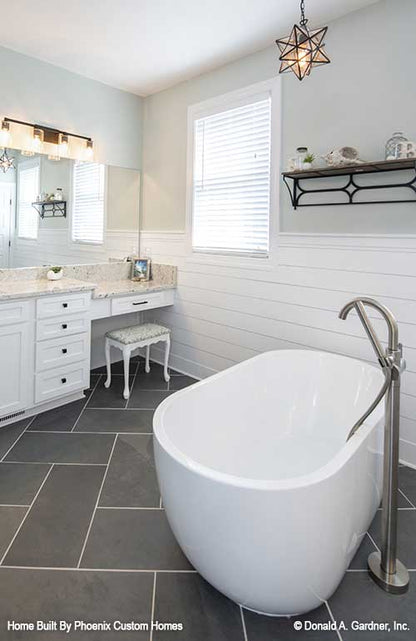 Elegant stand alone soaking tub in this master bath. Blarney plan 1424 