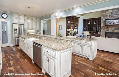 Double island shown in kitchen picture for house plan 1343 The Braxton