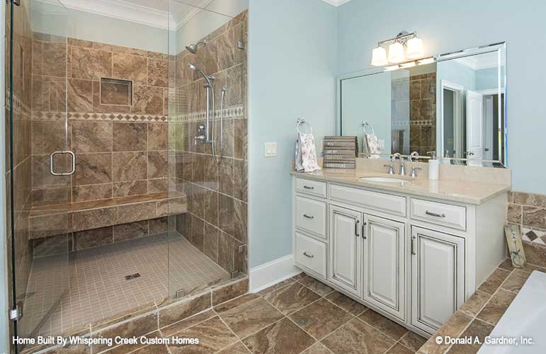 Master bathroom shower picture for house plan 1343 The Braxton